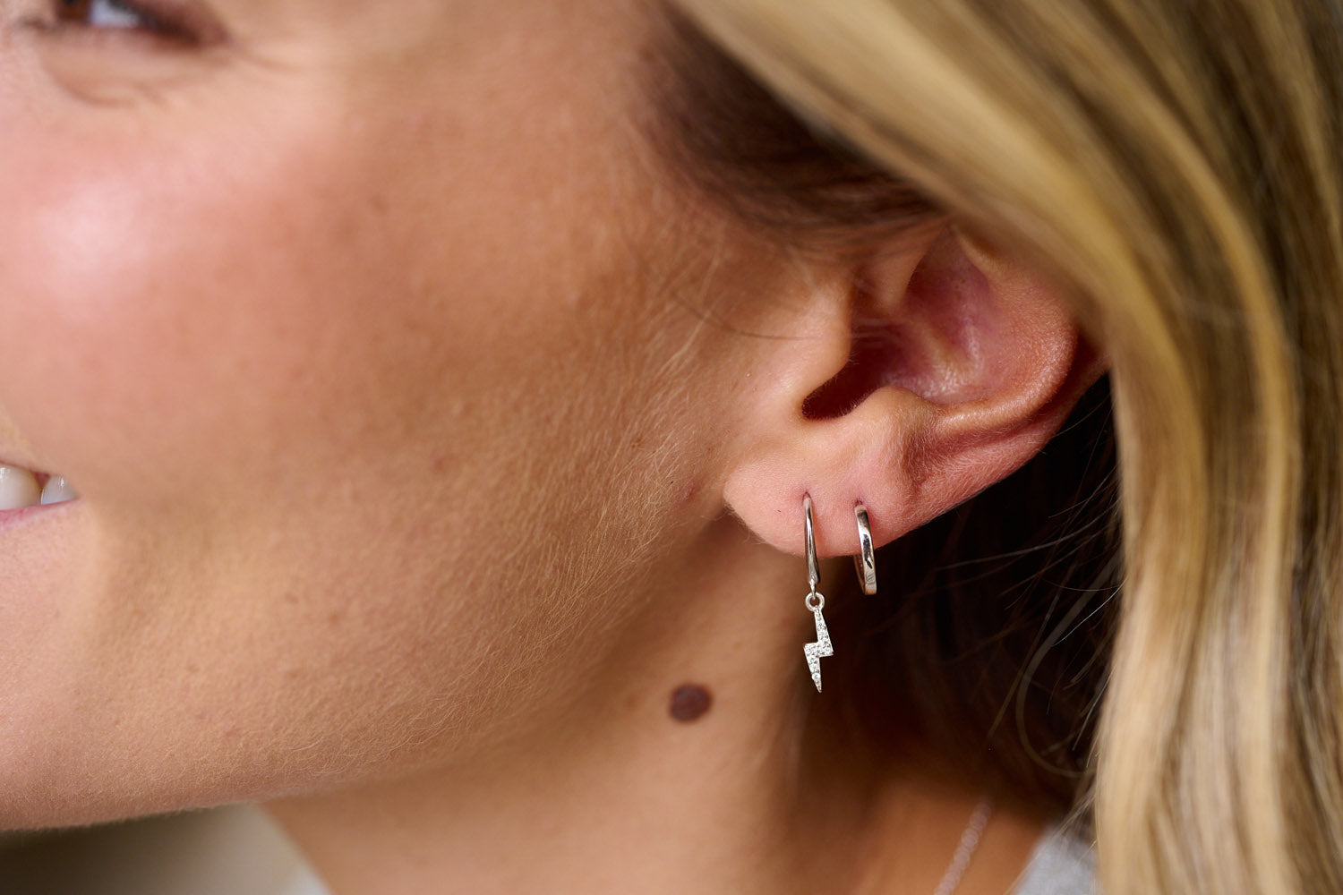 Callies Sterling Silver Lightning Bolt Huggies layered with plain reddy sterling earrings Boho Betty