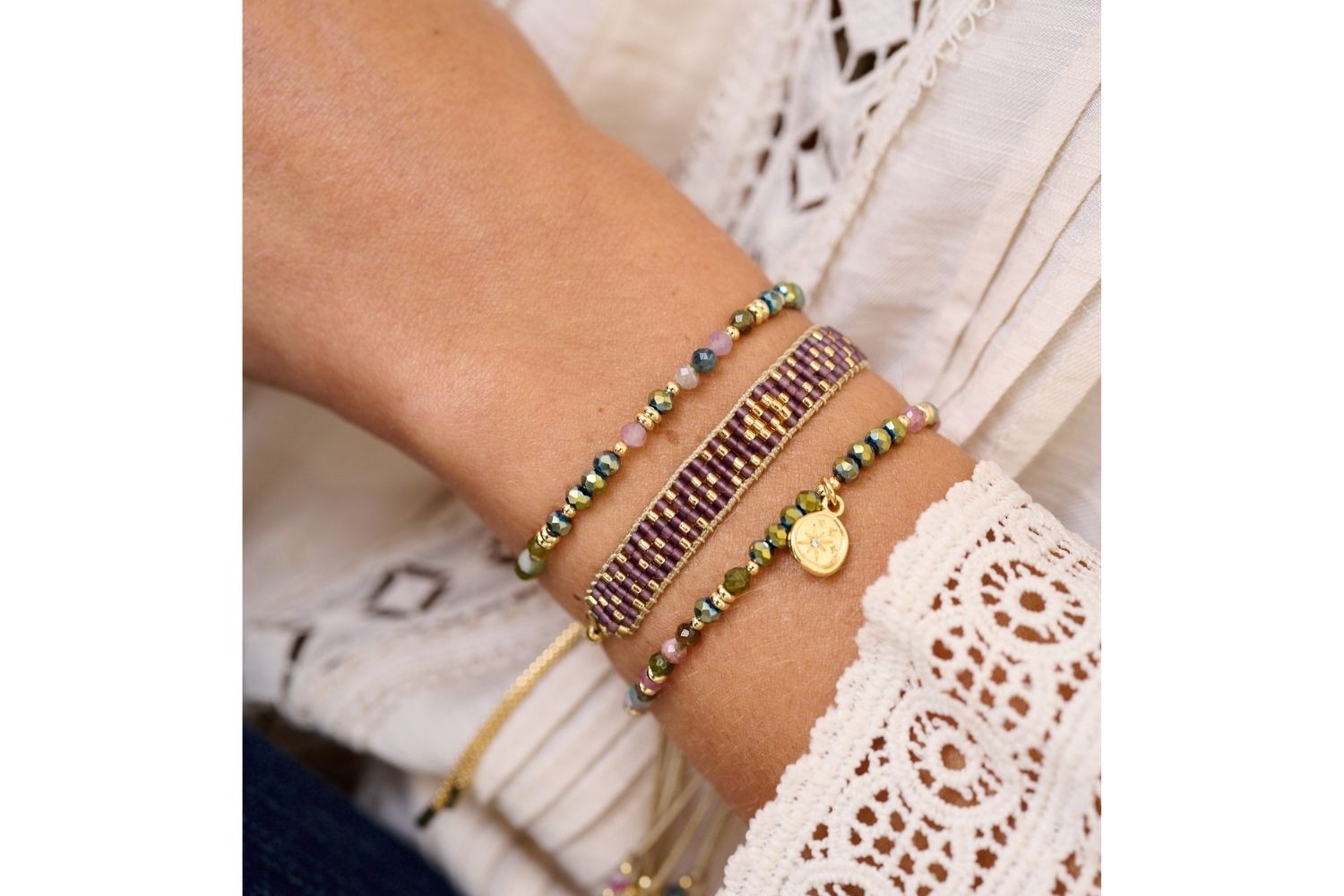 Arnala Gold & Tourmaline Bracelet Stack styled on the wrist, featuring vibrant tourmaline beads and gold accents, perfect for layering or gifting.