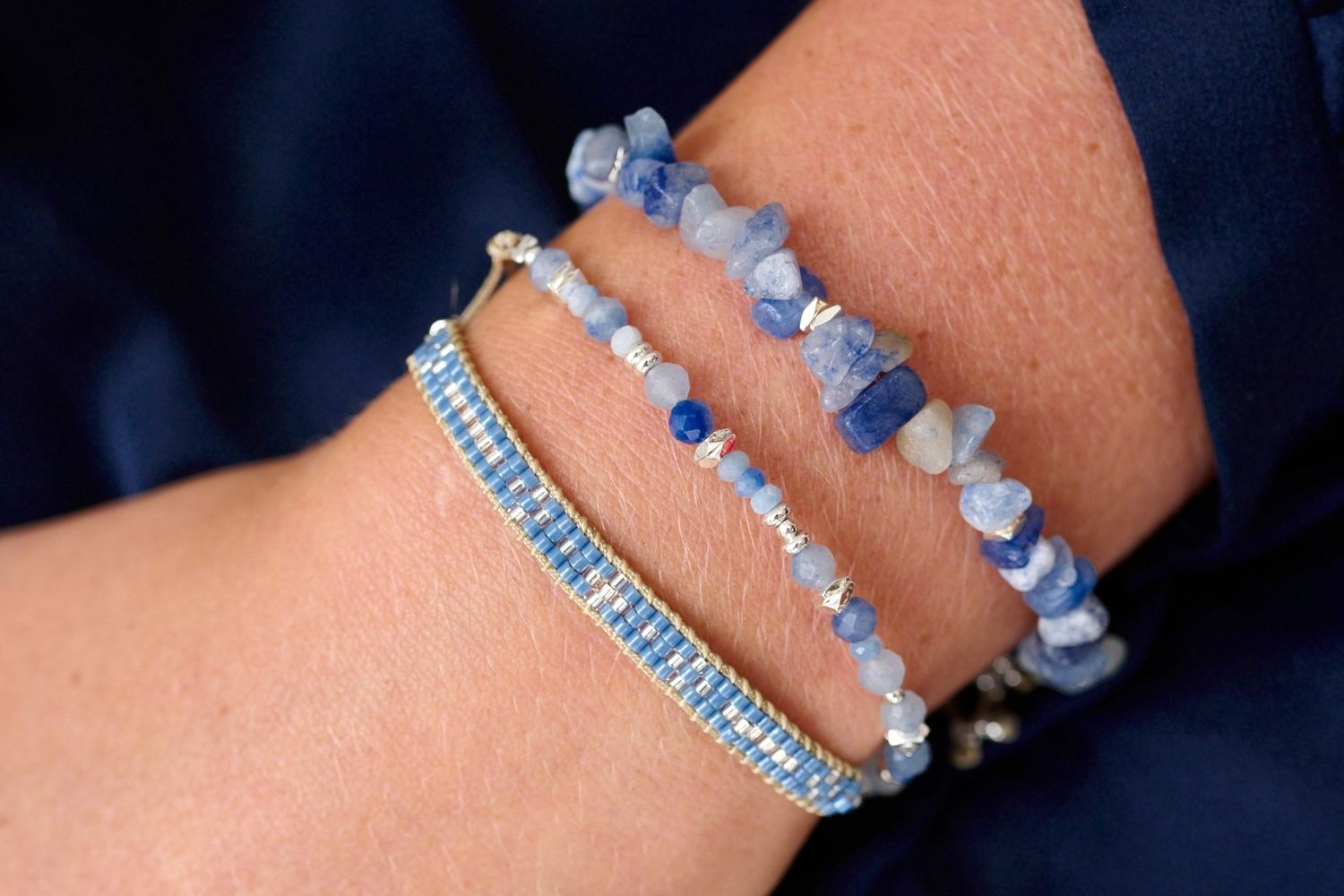 Aslan Silver & Blue Beaded Friendship Bracelet styled on the wrist, showcasing calming blue beads and sleek silver accents, ideal for layering and adding elegance to your look.