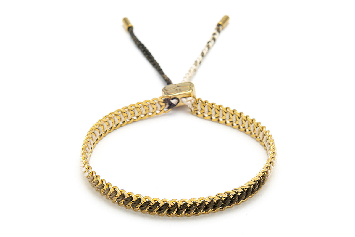 Athena White Gold Braided Bracelet featuring a white ombre thread woven through a 14k gold-plated curb chain, perfect for summer style and beach jewellery.