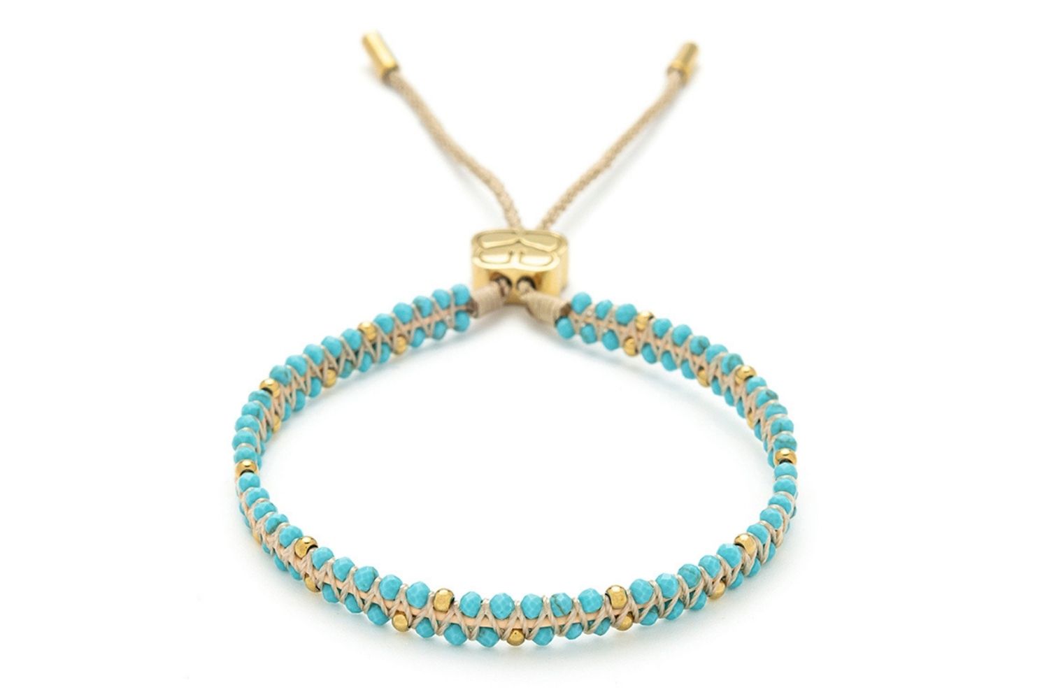 Cordelia Gold & Turquoise Braided Bracelet featuring turquoise howlite beads and 14k gold-plated PVD accents on a woven slider design, perfect for layering or as a beach-ready holiday gift.