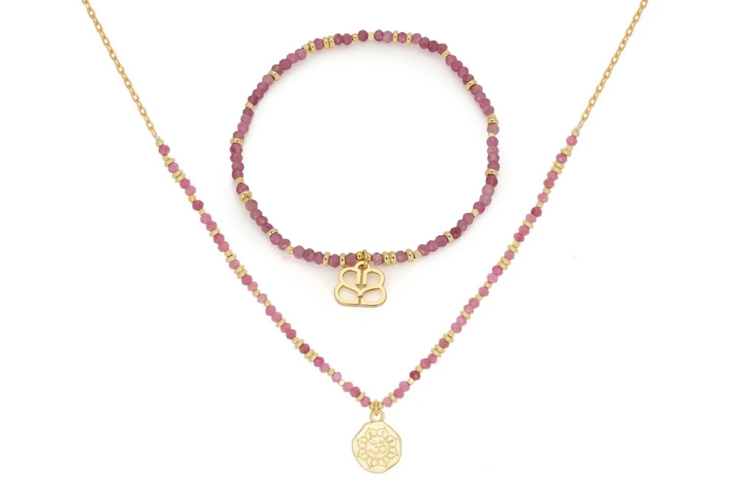 Dash Pink Tourmaline Necklace and Bracelet Set featuring vibrant pink tourmaline gemstone beads, an OM pendant, and 12k gold-plated accents, perfect for boho elegance and romantic style.