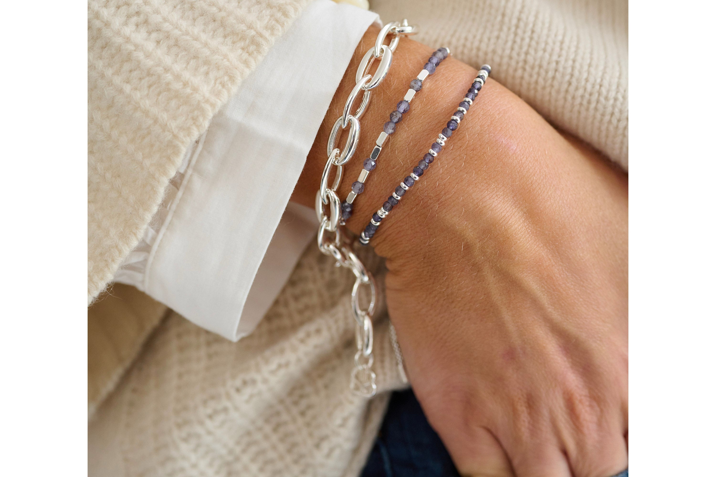 Dene Silver Chain Bracelet styled with a modern outfit, showcasing its chunky silver links and sleek toggle clasp for a bold and elegant look.