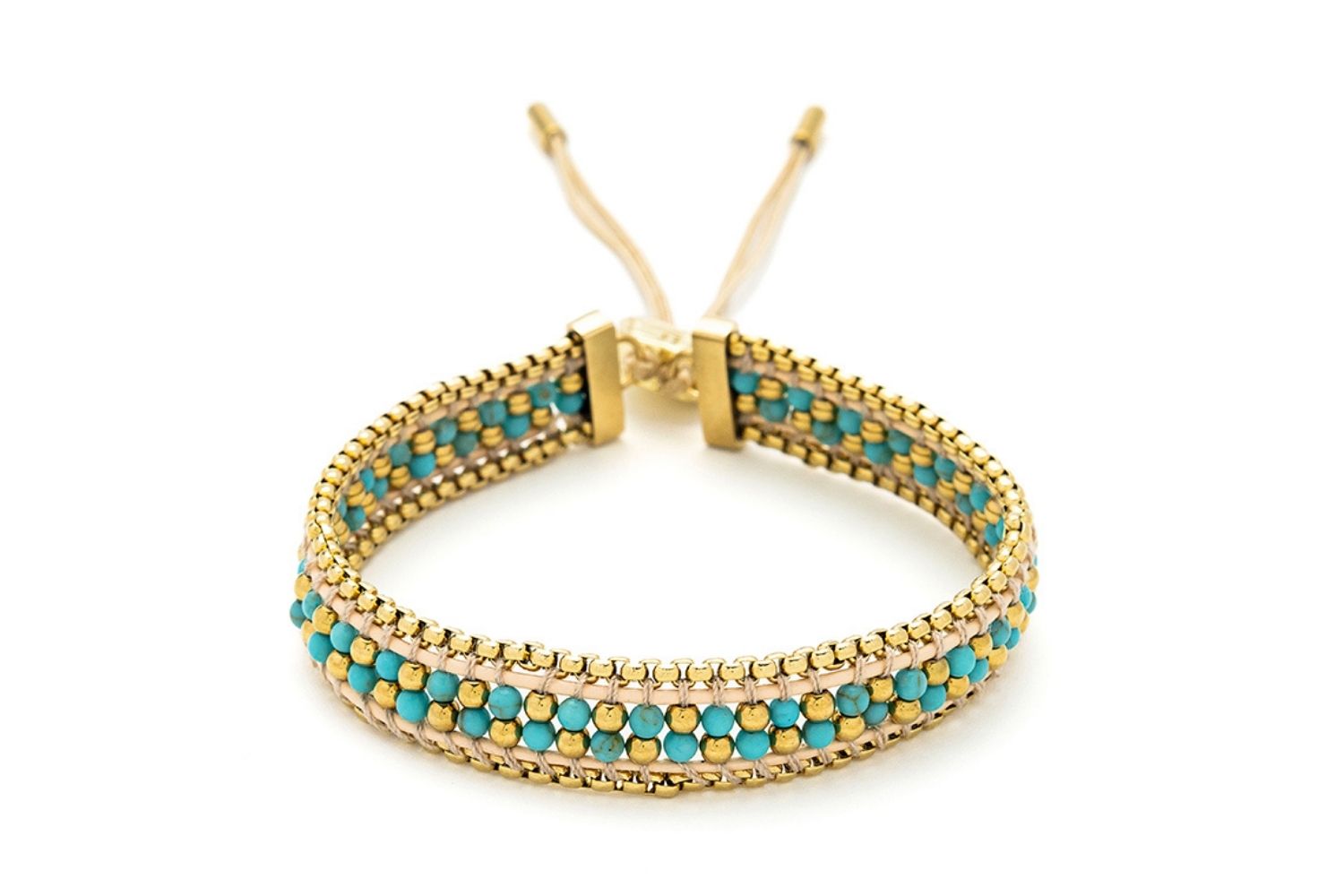 Isla Turquoise Gold Braided Bracelet with turquoise howlite beads, 14k gold-plated snake chain, and an adjustable slider, ideal for holiday jewellery and beach-inspired style.