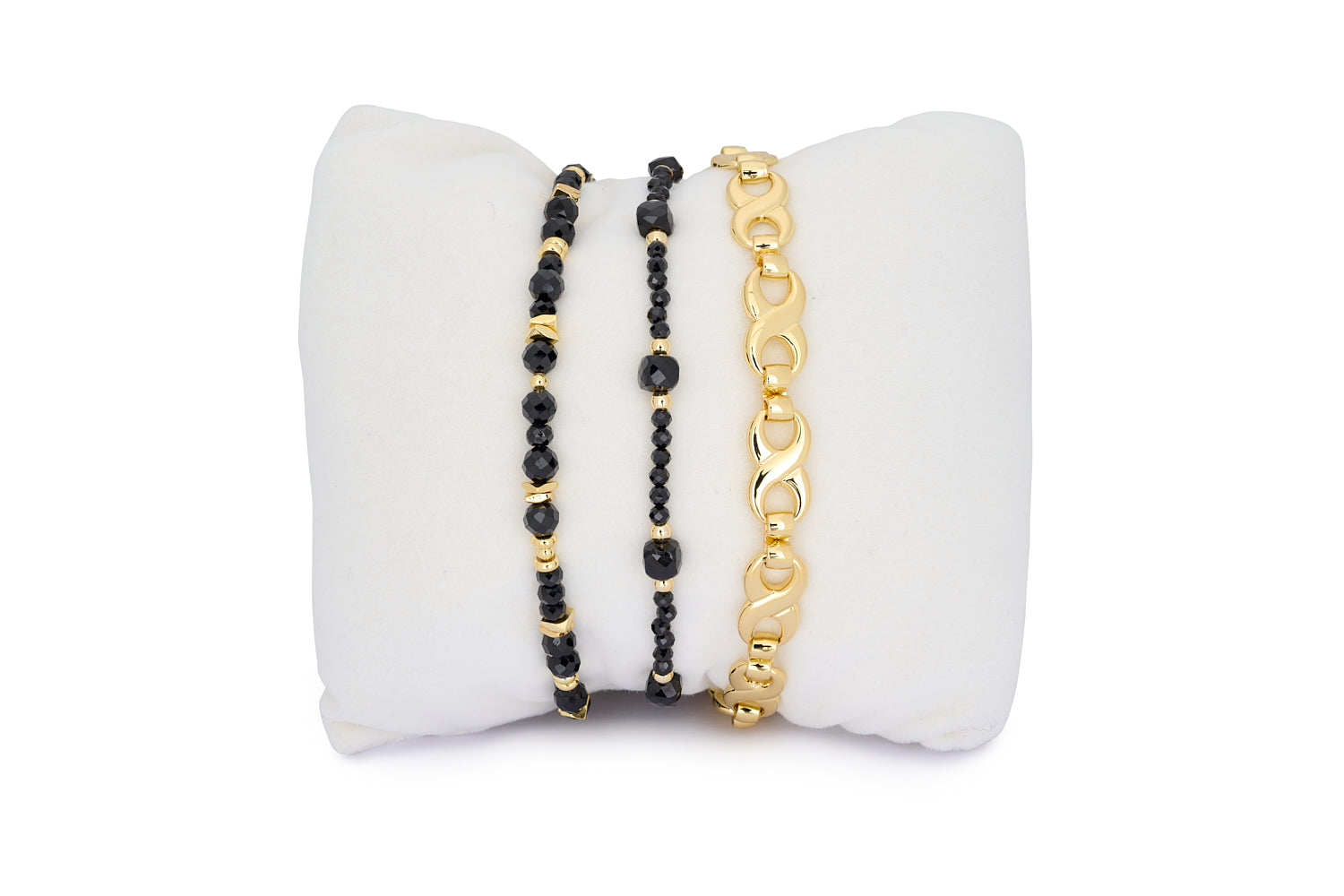 Izu Black Spinel Gold Stacking Bracelet featuring shimmering black gemstones and gold-plated accents for a bold, refined style.