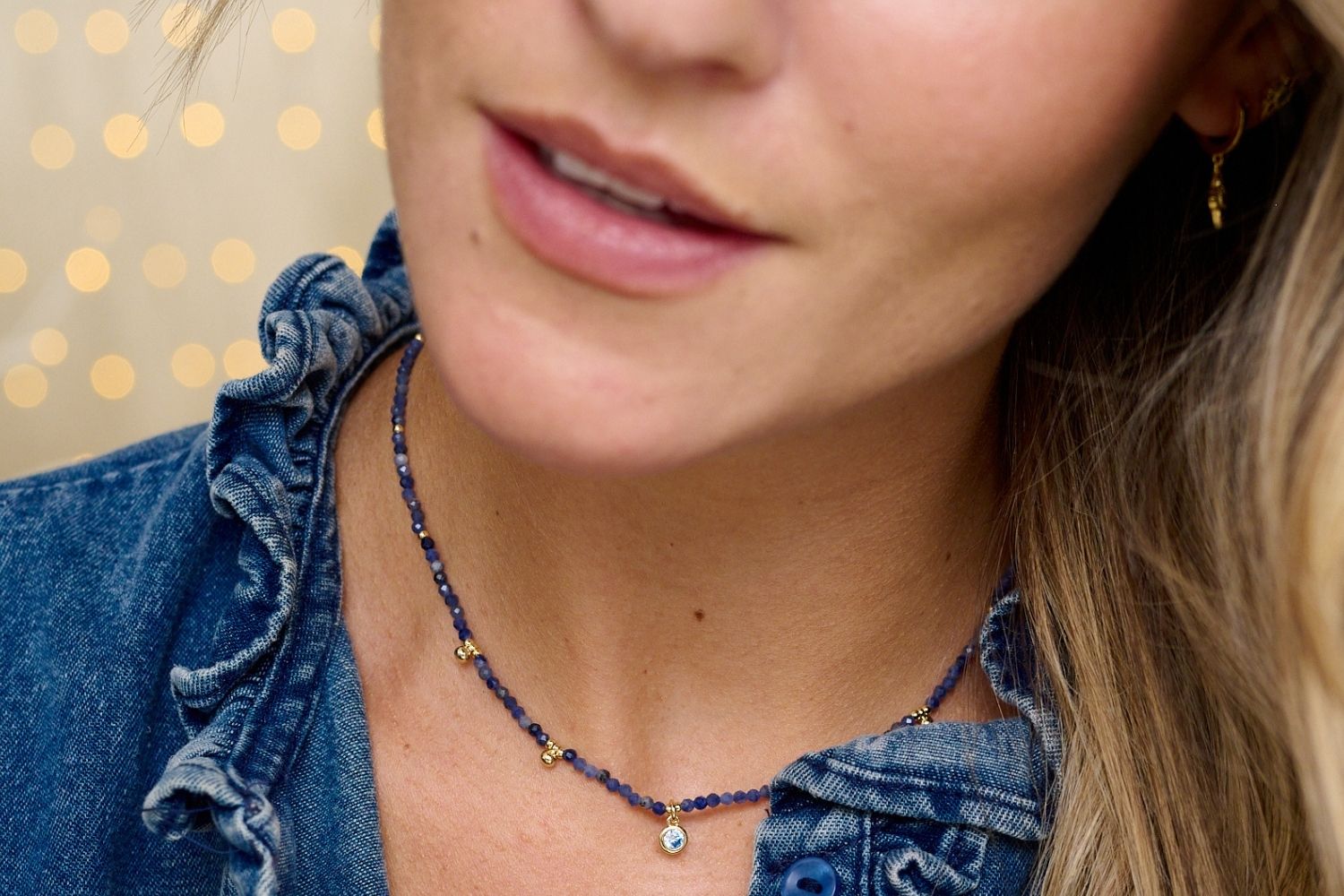 Jasmine Gold & Blue Aventurine Pendant Necklace styled on the neck, featuring blue Aventurine beads, a CZ pendant, and gold accents, perfect for layering or wearing solo.