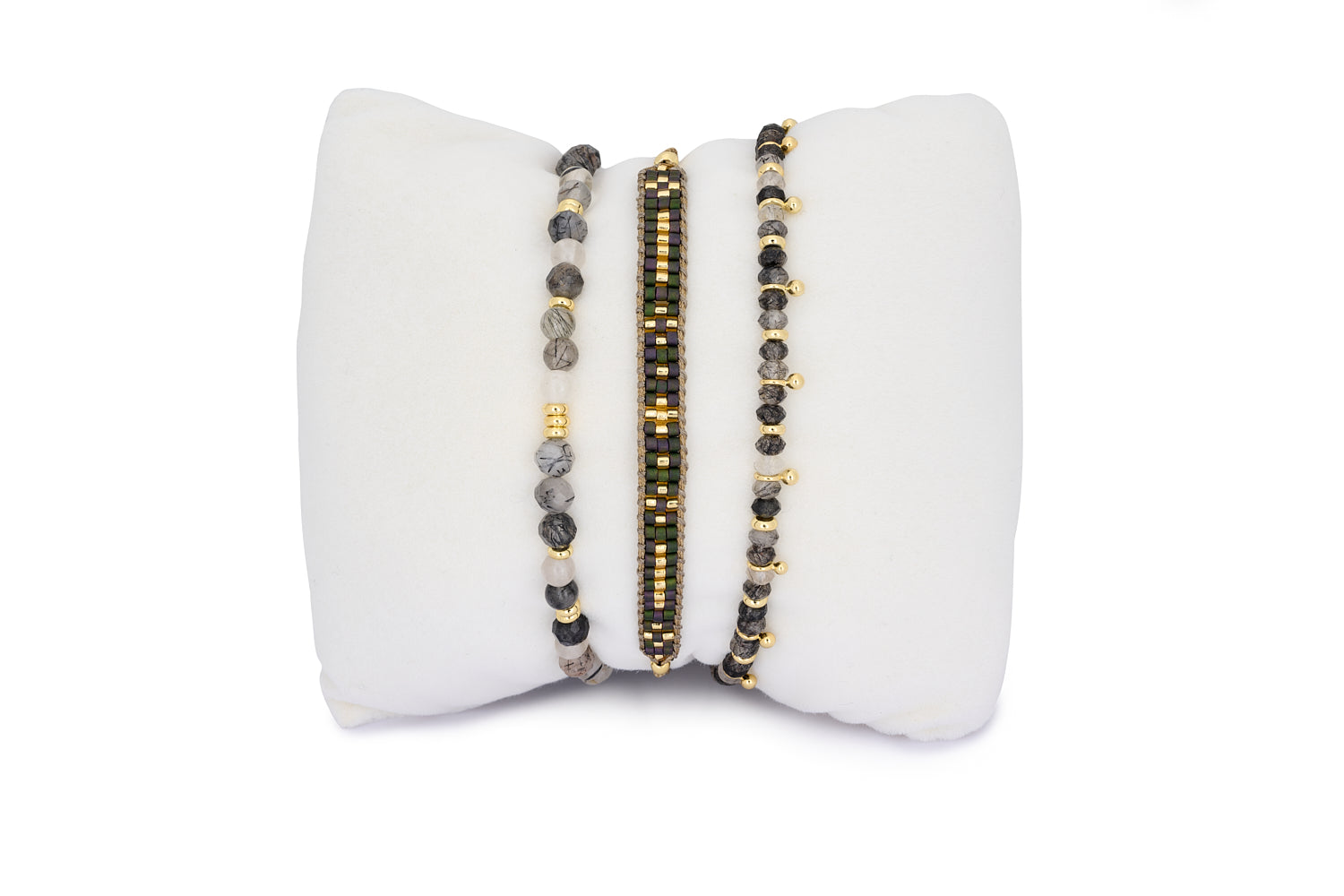 Keramas Black Rutilated Quartz Gold Bracelet Stack featuring shimmering black rutilated quartz gemstones and gold-plated accents for a glamorous, boho-chic look.