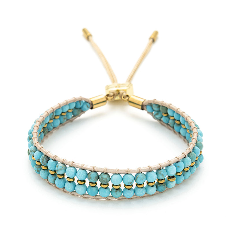 Lana Turquoise Gold Bracelet featuring turquoise howlite beads and 14k gold-plated accents, a perfect accessory for beachwear and summer style.