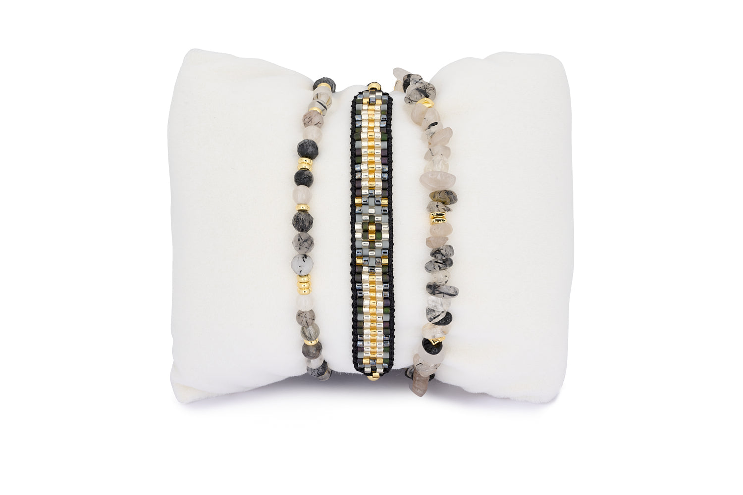 Lovina Black Rutilated Quartz Gold Bracelet Stack featuring three gemstone bracelets with faceted black rutilated quartz and gold-plated accents.