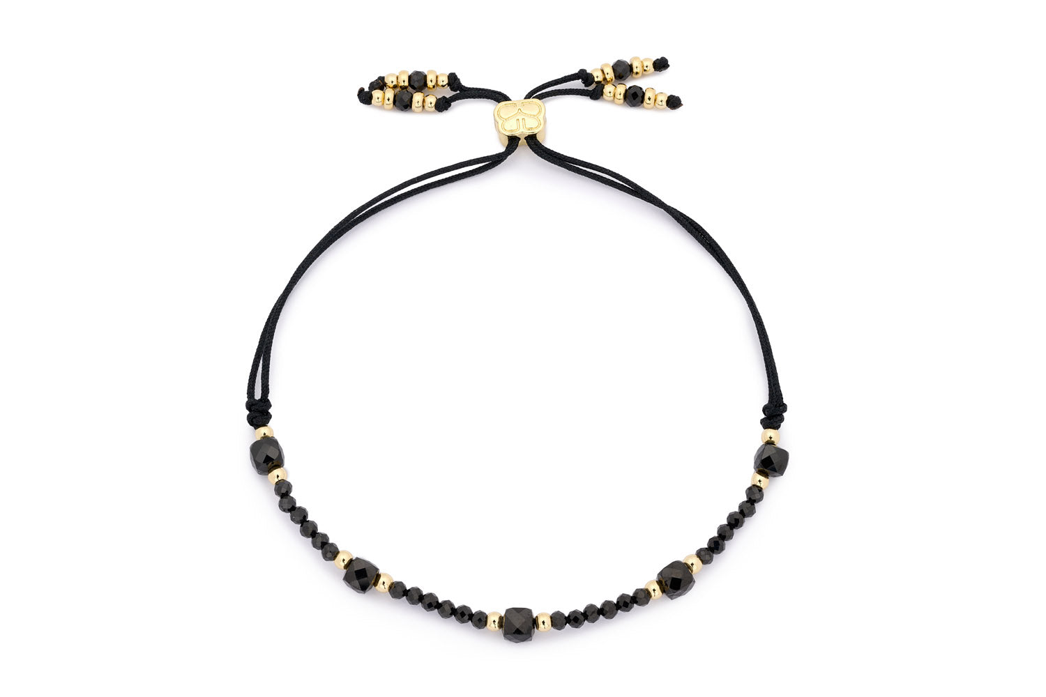 Meadow Gold & Black Spinel Gemstone Slider Bracelet featuring faceted black Spinel beads and gold-plated accents with an adjustable slider design.