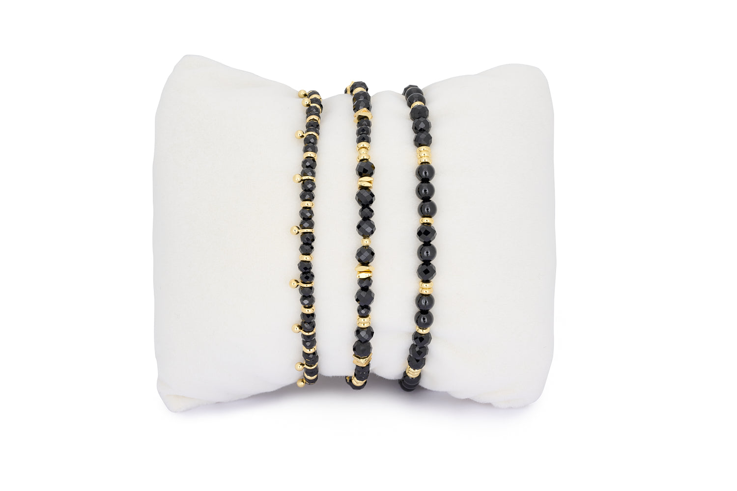 Moala Black Spinel Gold Stacking Bracelet featuring shimmering black gemstones and luxurious gold-plated accents for a celestial, boho-chic look.