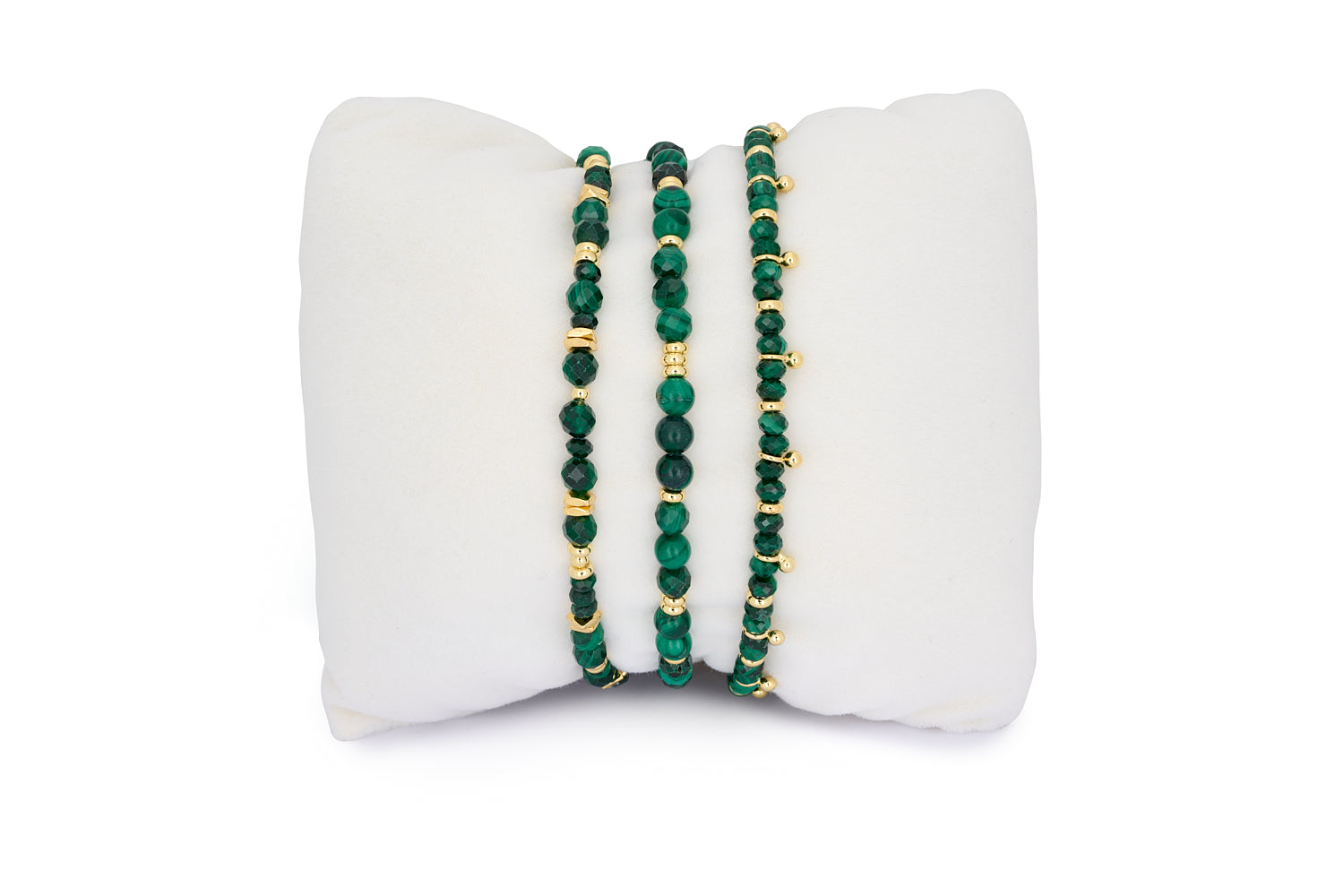 Moala Malachite Gold Bracelet Stack featuring deep green malachite gemstones with 12k gold-plated accents, designed for layering or gifting as a meaningful bracelet set.