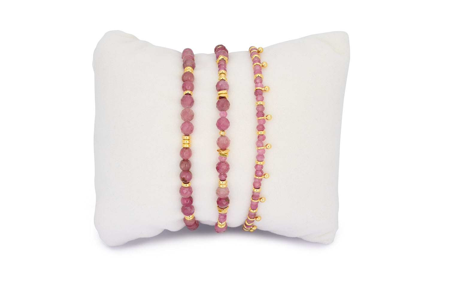 Moana Gold & Pink Tourmaline Beaded Bracelet Stack featuring three pink tourmaline gemstone bracelets with gold-plated accents, designed for stacking or gifting as a thoughtful self-care bracelet set.