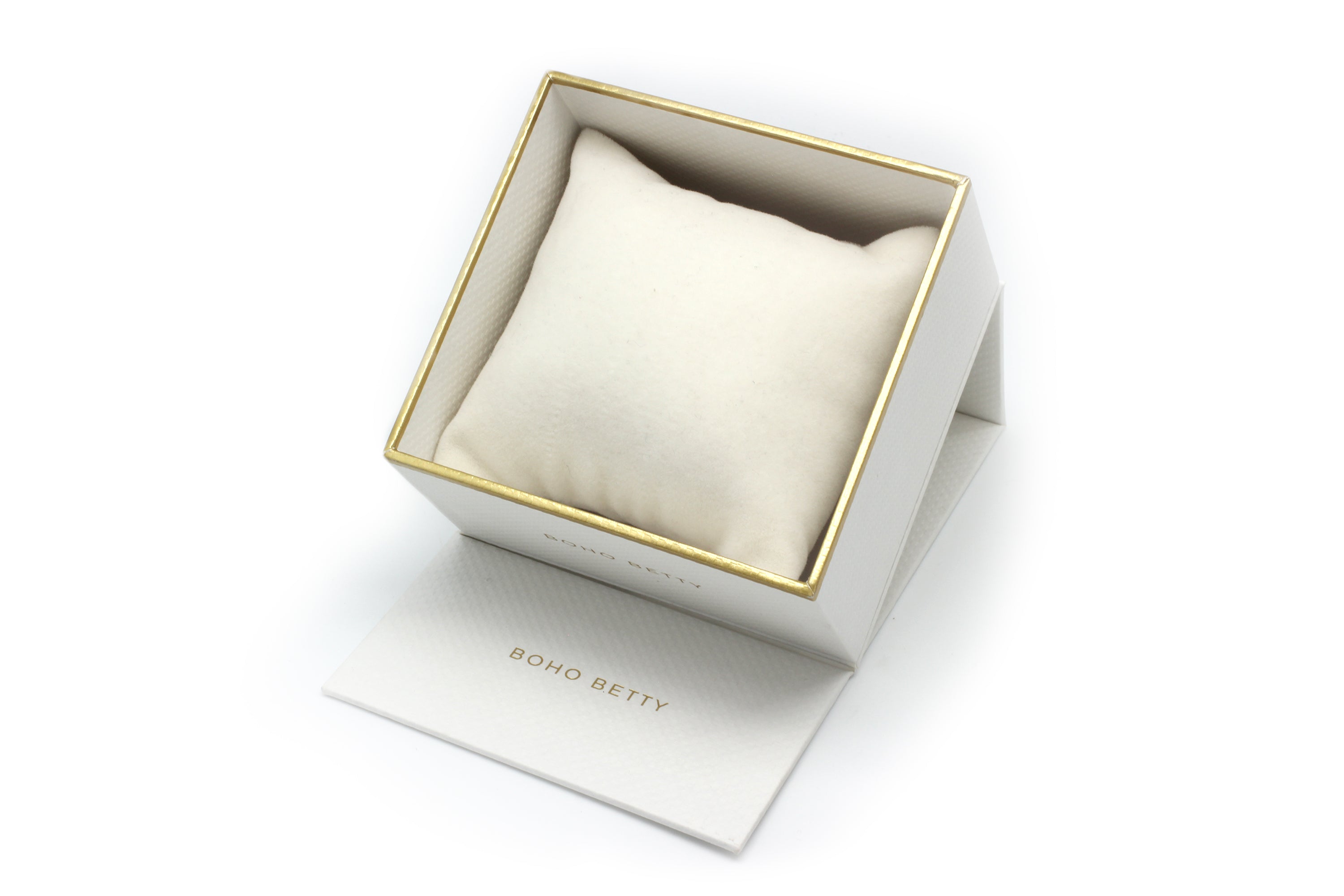 Boho Betty luxury jewellery box featuring a white exterior with gold accents and an elegant cushion for displaying stacked bracelets. File Name: boho-betty-bracelet-stack-luxury-gift-box