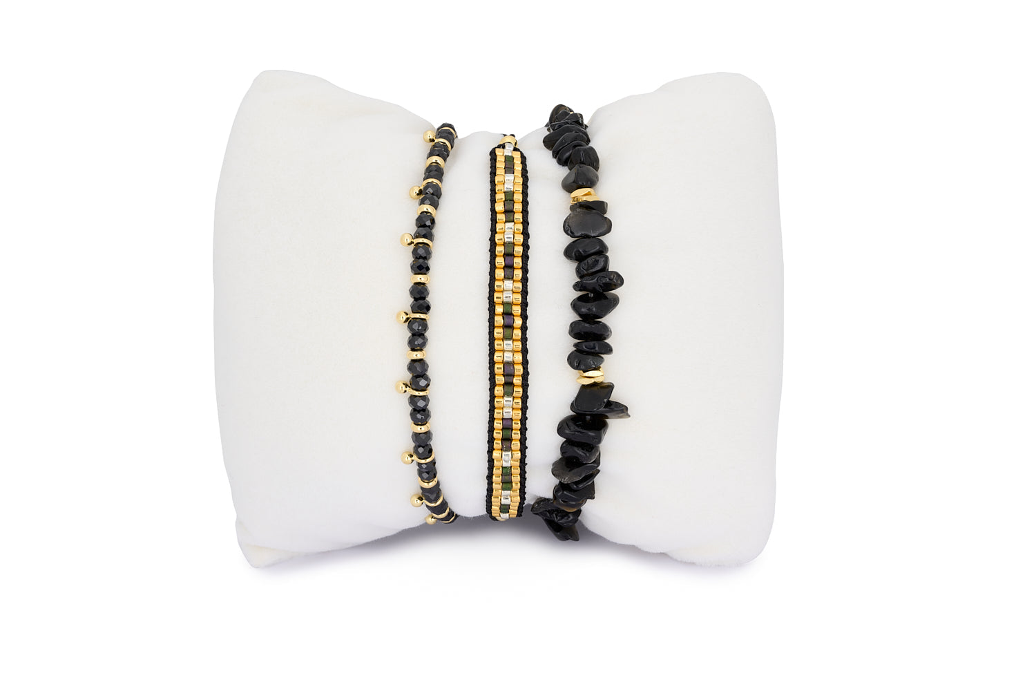 Tahiti Black Spinel Gold Bracelet Stack featuring three gemstone bracelets with black spinel and gold-plated accents for a luxurious boho-chic style.