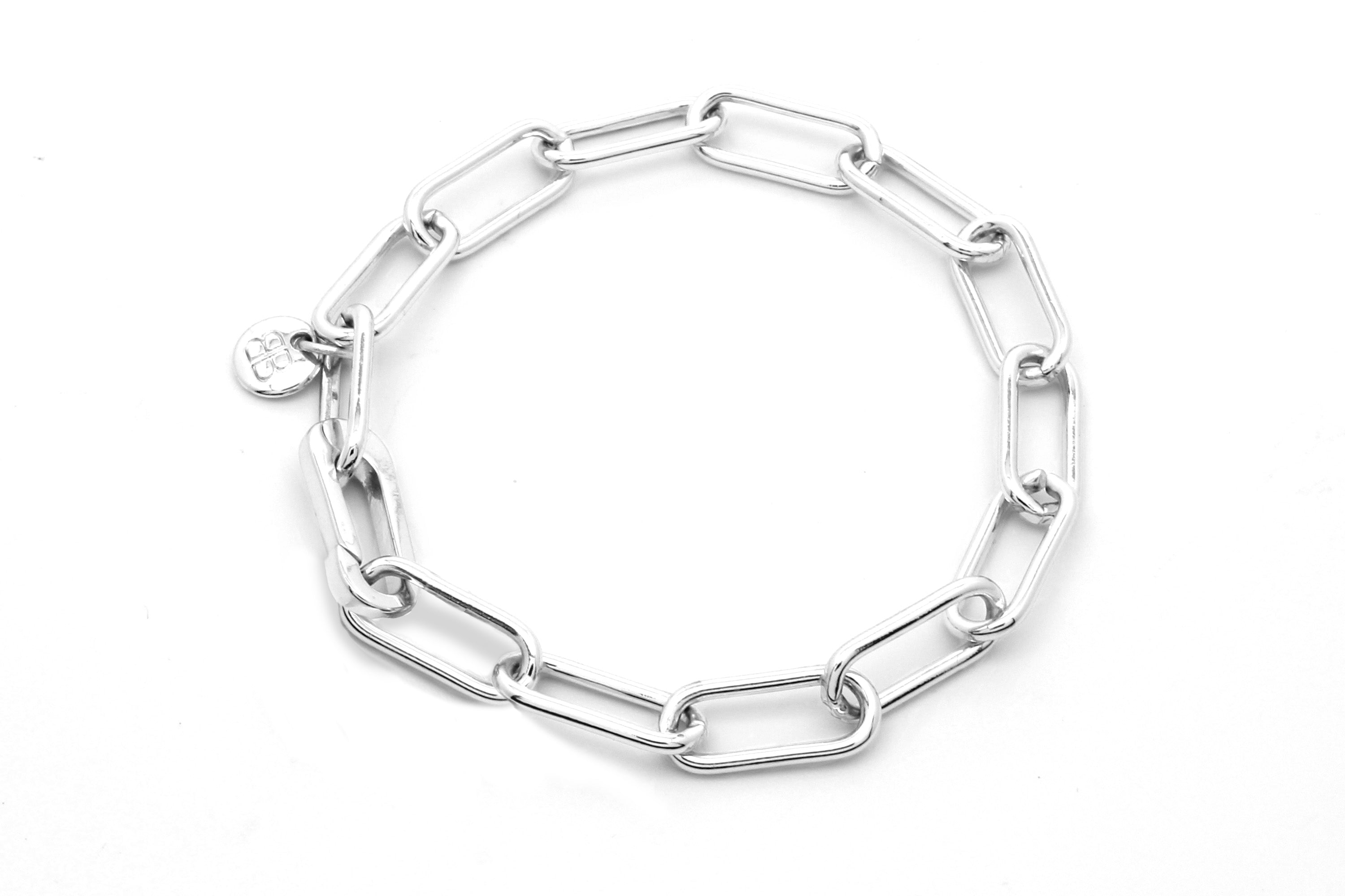 Ukelele Silver Chain Bracelet featuring chunky geometric links in polished sterling silver plating, perfect for a bold and modern look.