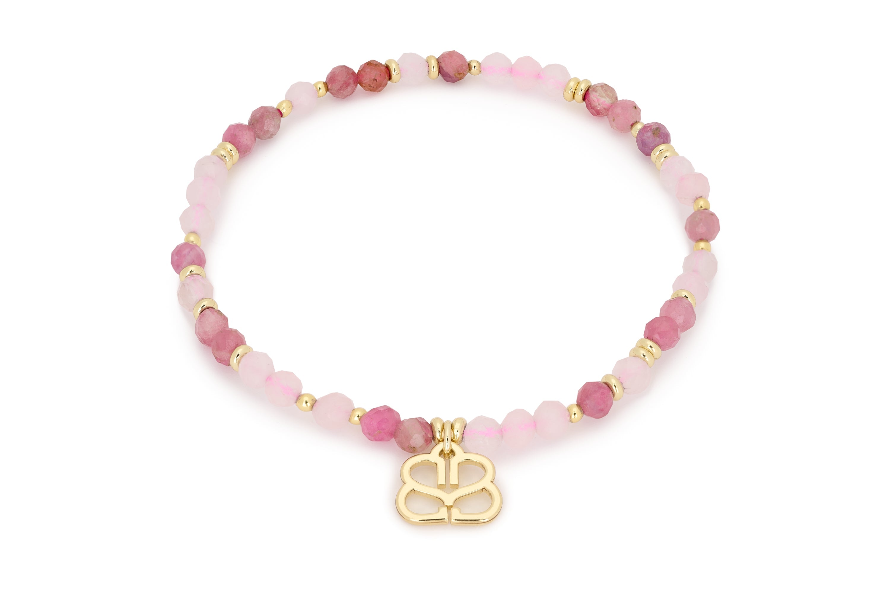 A stretch bracelet with pink tourmaline and rose quartz gemstones and gold findings