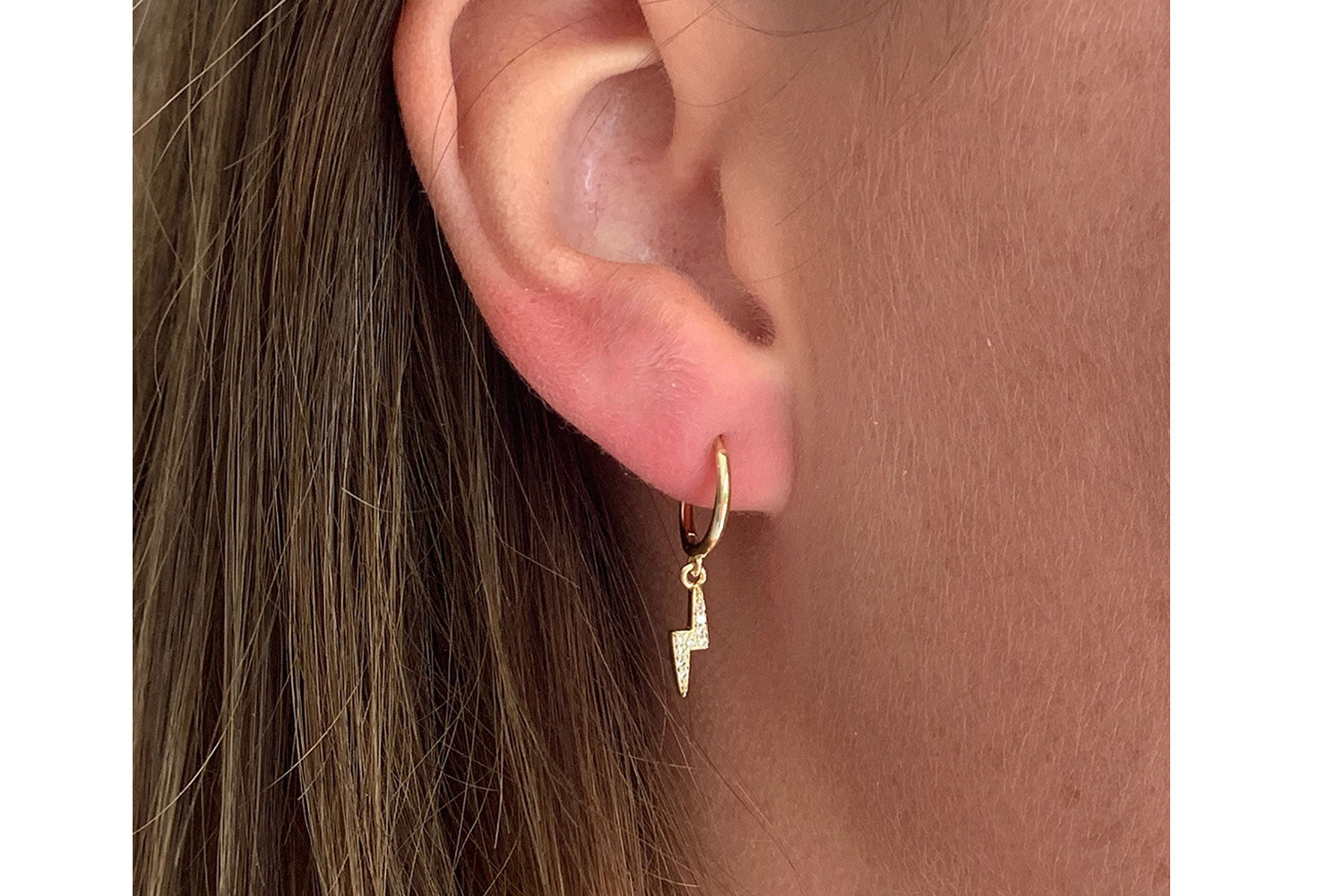 Lightning on sale huggie earrings