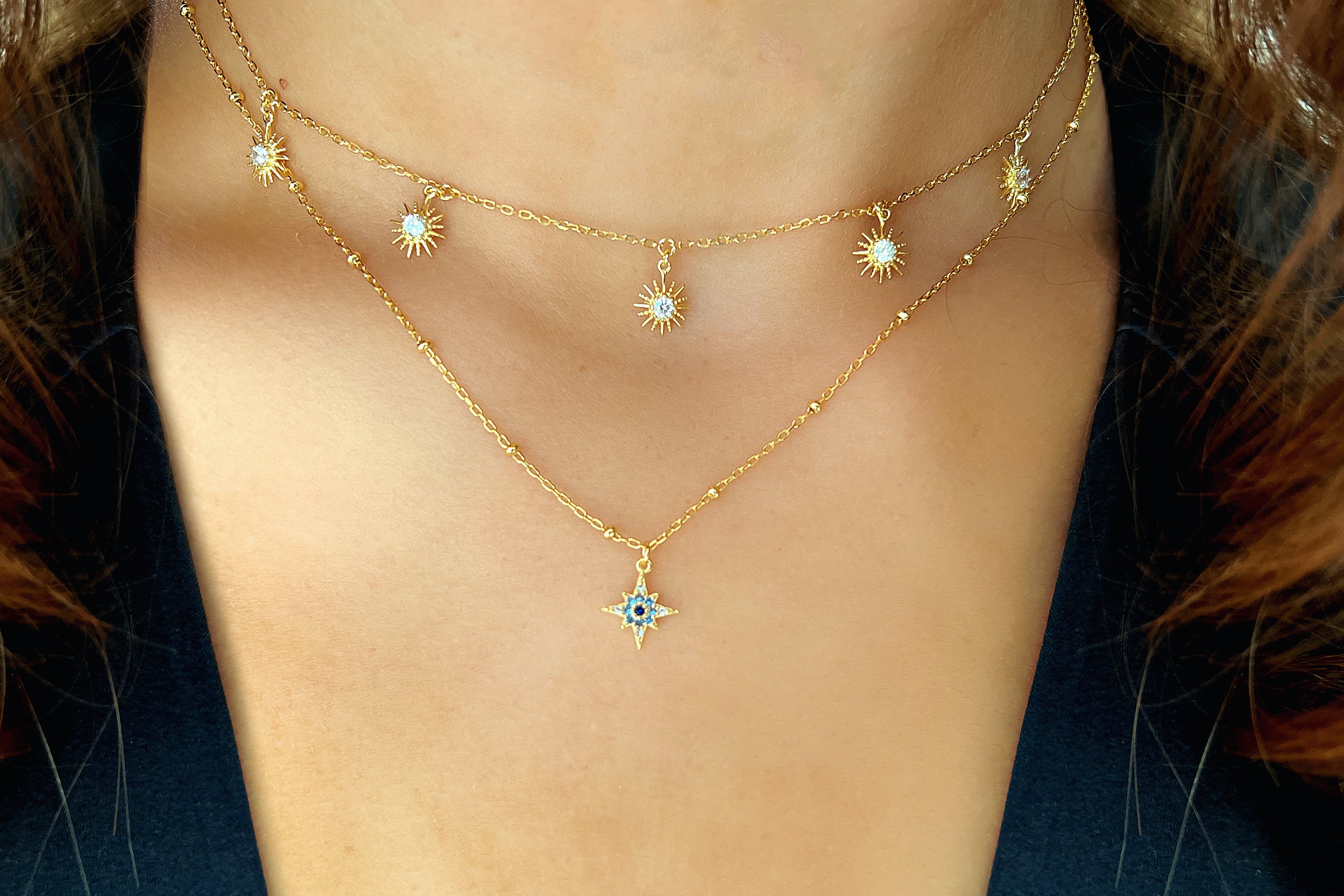 Blue Ombre CZ Gold Sterling Silver Star Necklace styled to perfection, showcasing the sparkling CZ star pendant on a delicate silver chain.