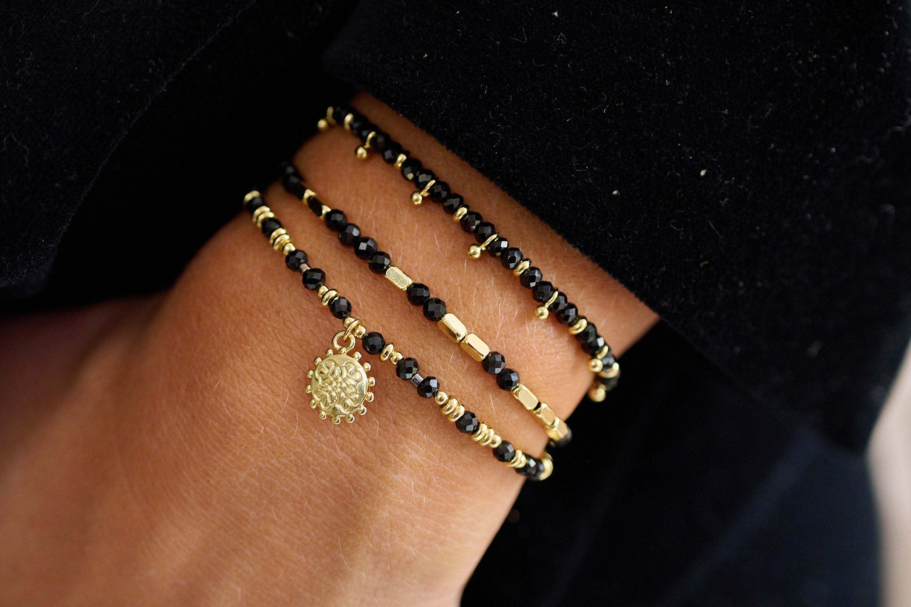 Gold bracelet deals with black thread